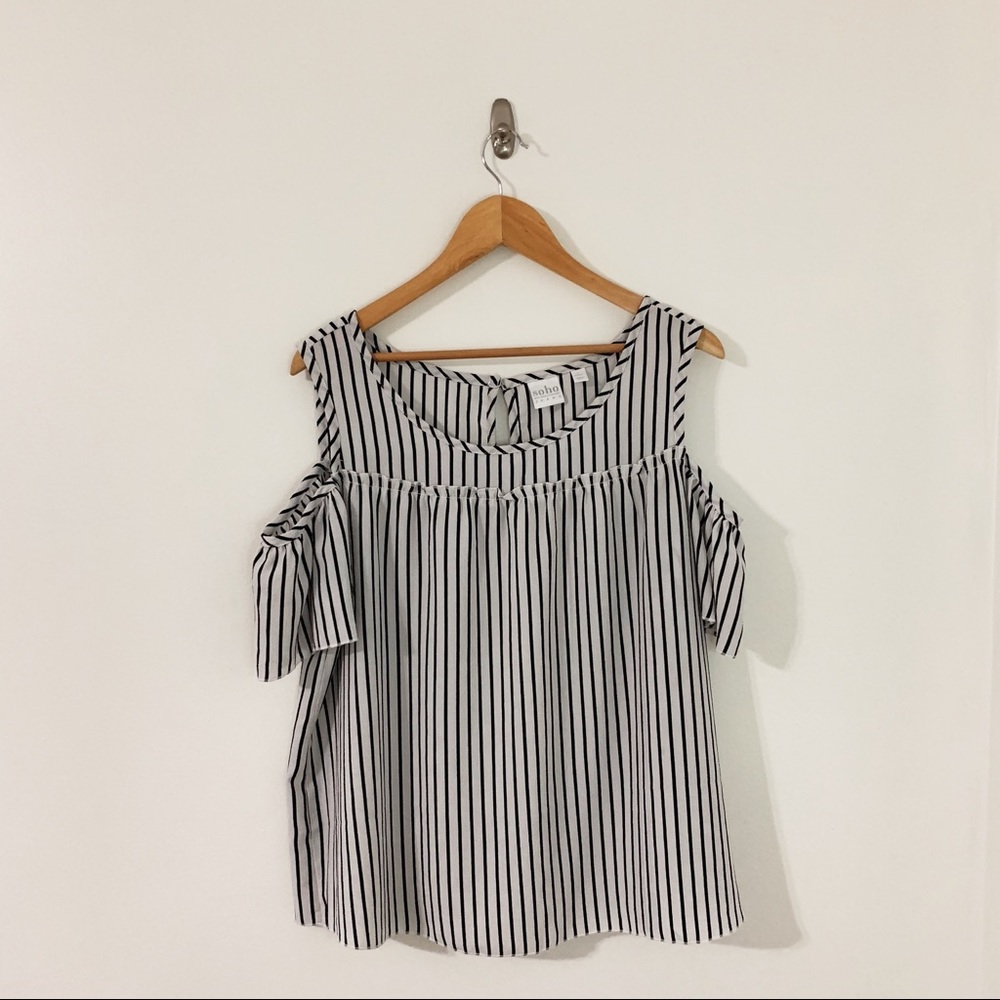 Black and white top with cut out sleeves!
